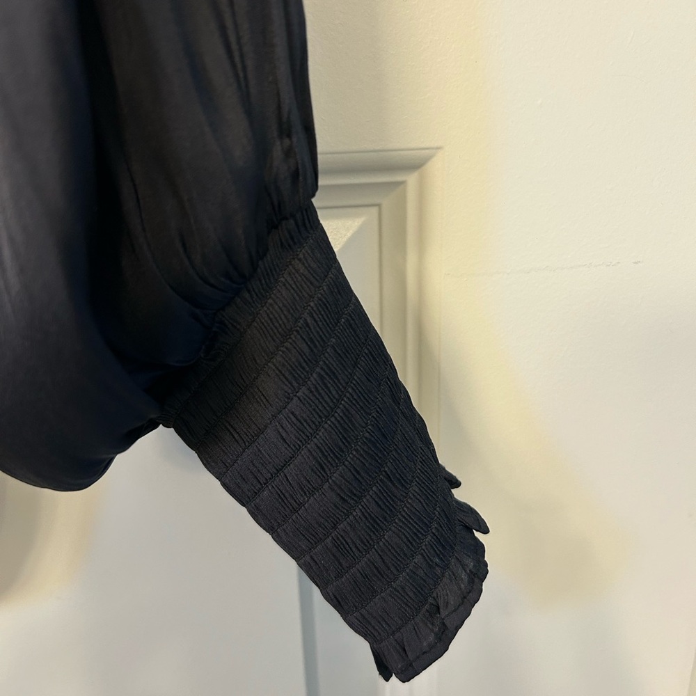 Elegant Black Blouse with Ruched Sleeves